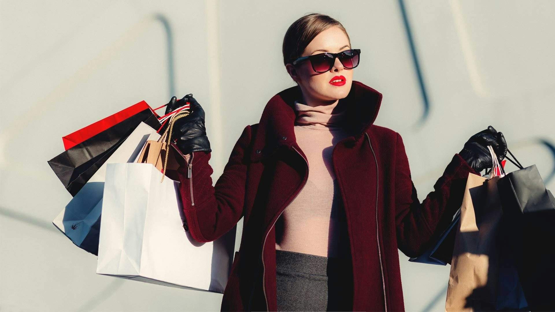 Woman Holding Shopping Bags